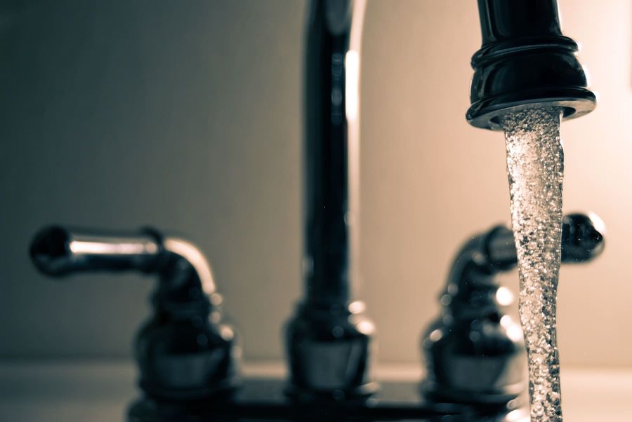 Clean water running from a kitchen faucet